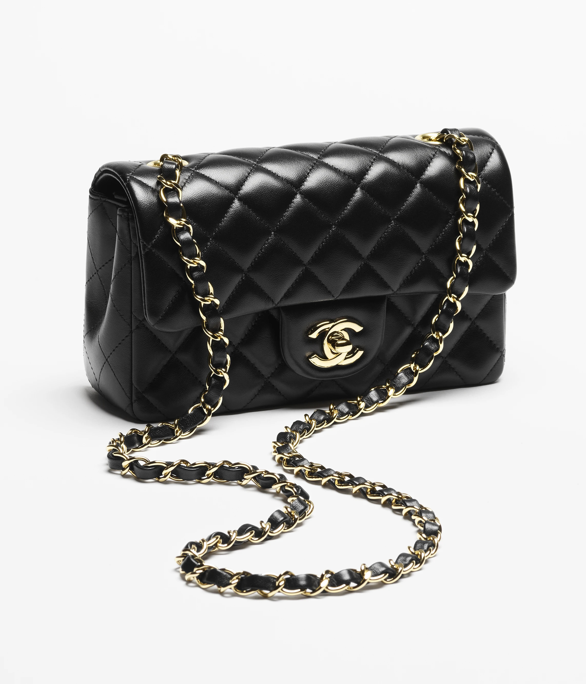 Mini Flap Bag

            
		Lambskin & Gold-Tone Metal
	
		Black | Chanel, Inc. (US)