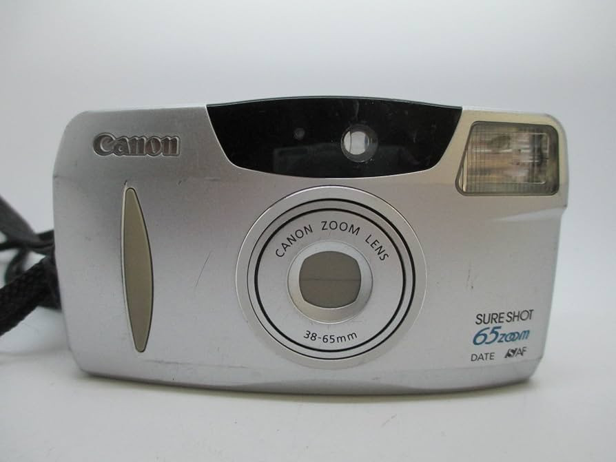 Canon Sure Shot 65 Zoom Date 35mm Point And Shoot Film Camera w/ Built-in Flash and Motor Drive (... | Amazon (US)