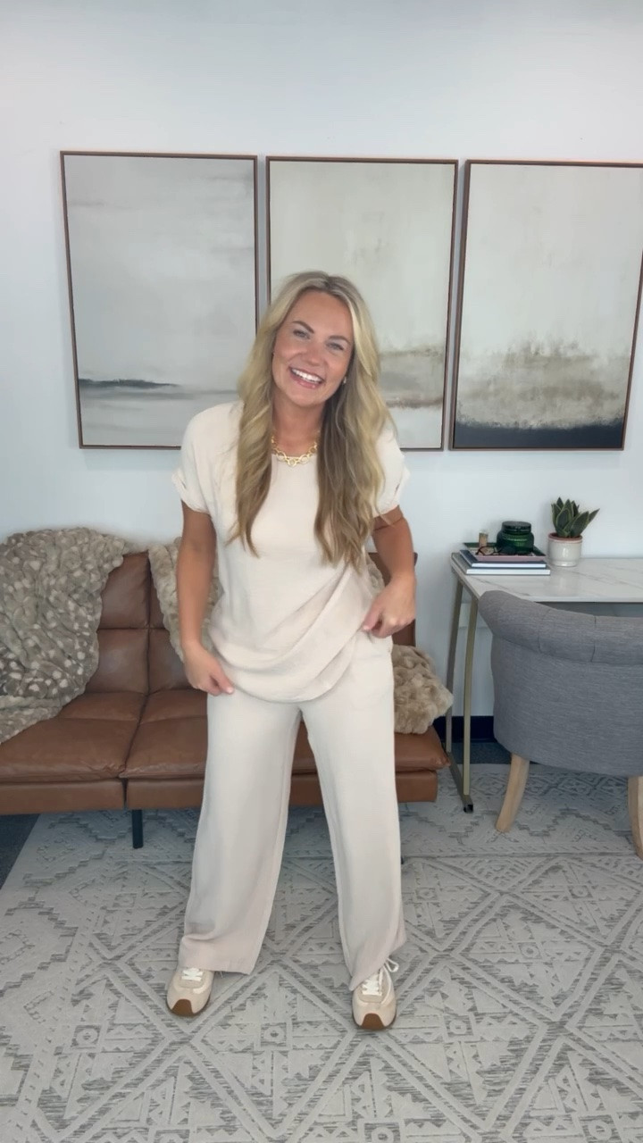 This neutral matching set is such an easy option for travel days when comfort is the priority but you still want to feel put together. I love the wide leg pants with sneakers and a little gold jewelry.

neutral matching set, travel outfit, wide leg pants, airport outfit, comfortable travel style, two piece set, casual outfit, neutral outfit, travel day style, womens matching set, AudrieDollins

#LTKootd #LTKTravel #LTKSeasonal
