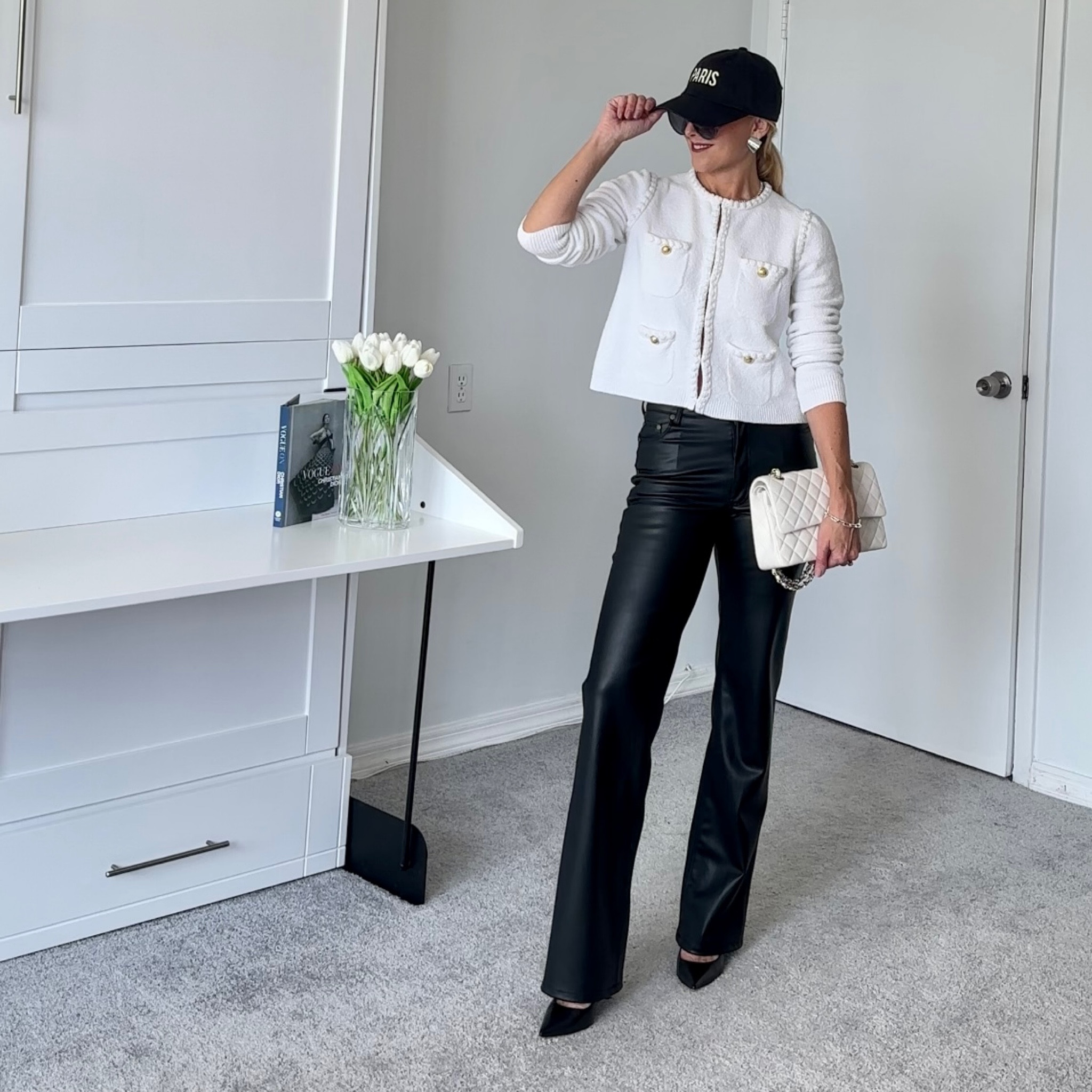 Styling a classic lady jacket with a bit of an edge with faux leather pants and an unexpected baseball hat.

#LTKSale #LTKunder100 #LTKSeasonal