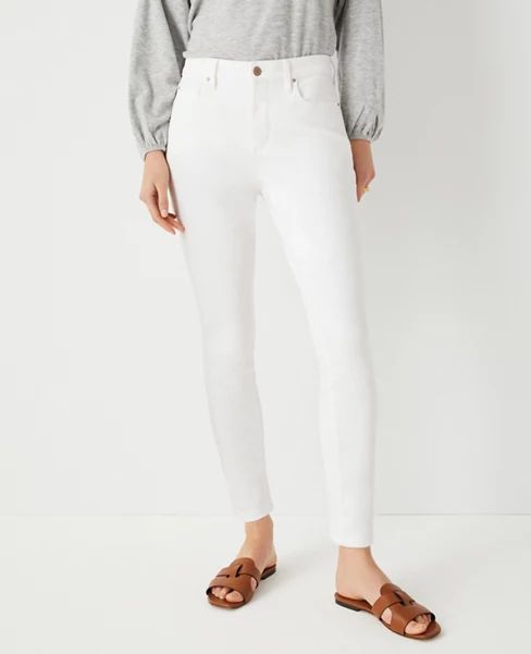 Sculpting Pocket Mid Rise Skinny Jeans in White | Ann Taylor (US)