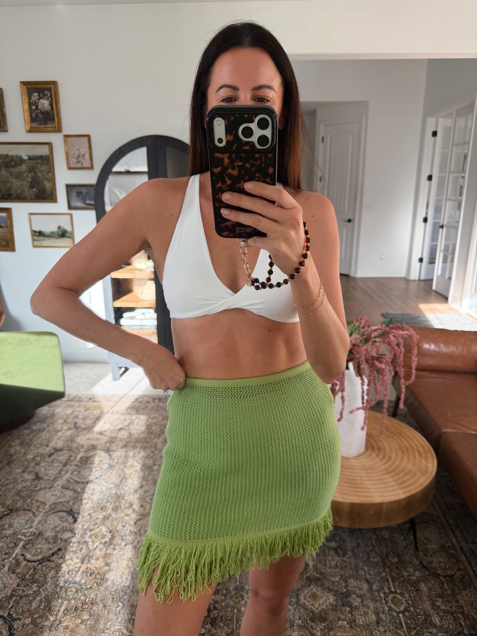 This white twist top bikini is so cute and looks great with this green cover-up skirt! Perfect for spring break and any beach vacation or pool time you have coming up!