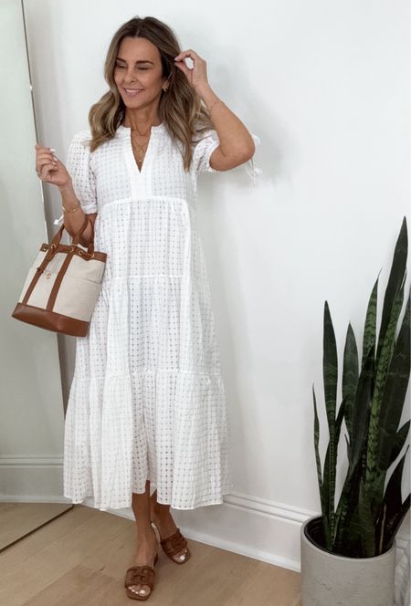DISCOUNT CODE TAMMY15 Wearing XS
I’m 5’6”
White eyelet midi dress that is so gorgeous! Lined and very comfortable! Modest v-neck and cute ties at the sleeve. 

Finally grabbed the bag I’ve been wanting since I saw it! Just restocked! It’s the perfect summer bag, available in black/canvas as well. 

#LTKtravel #LTKover40 #LTKstyletip