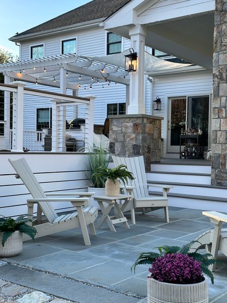 Sleek and modern Adirondack chairs. These are an investment and will last for many many years with their maintenance free material 
Color shown is Whitewash 

#LTKSeasonal #LTKhome #LTKstyletip