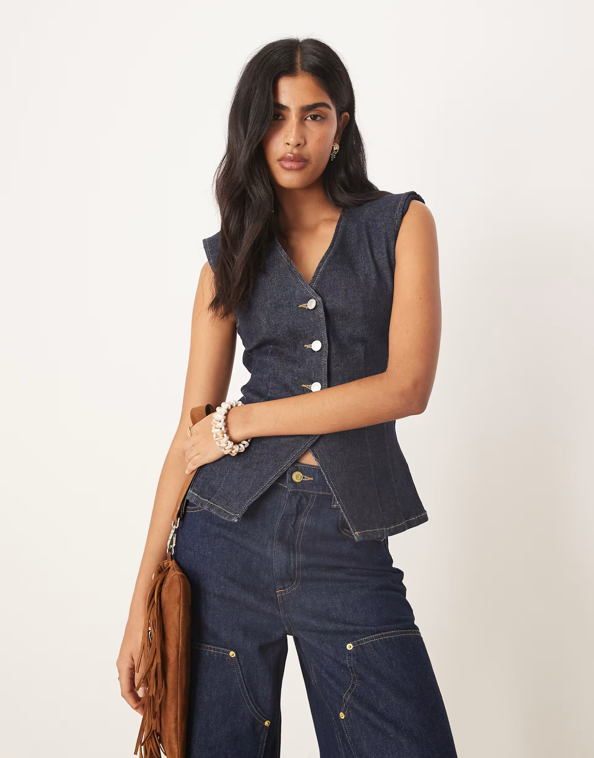 ASOS DESIGN cinched waist denim waistcoat with shoulder pads in rinse wash | ASOS (Global)