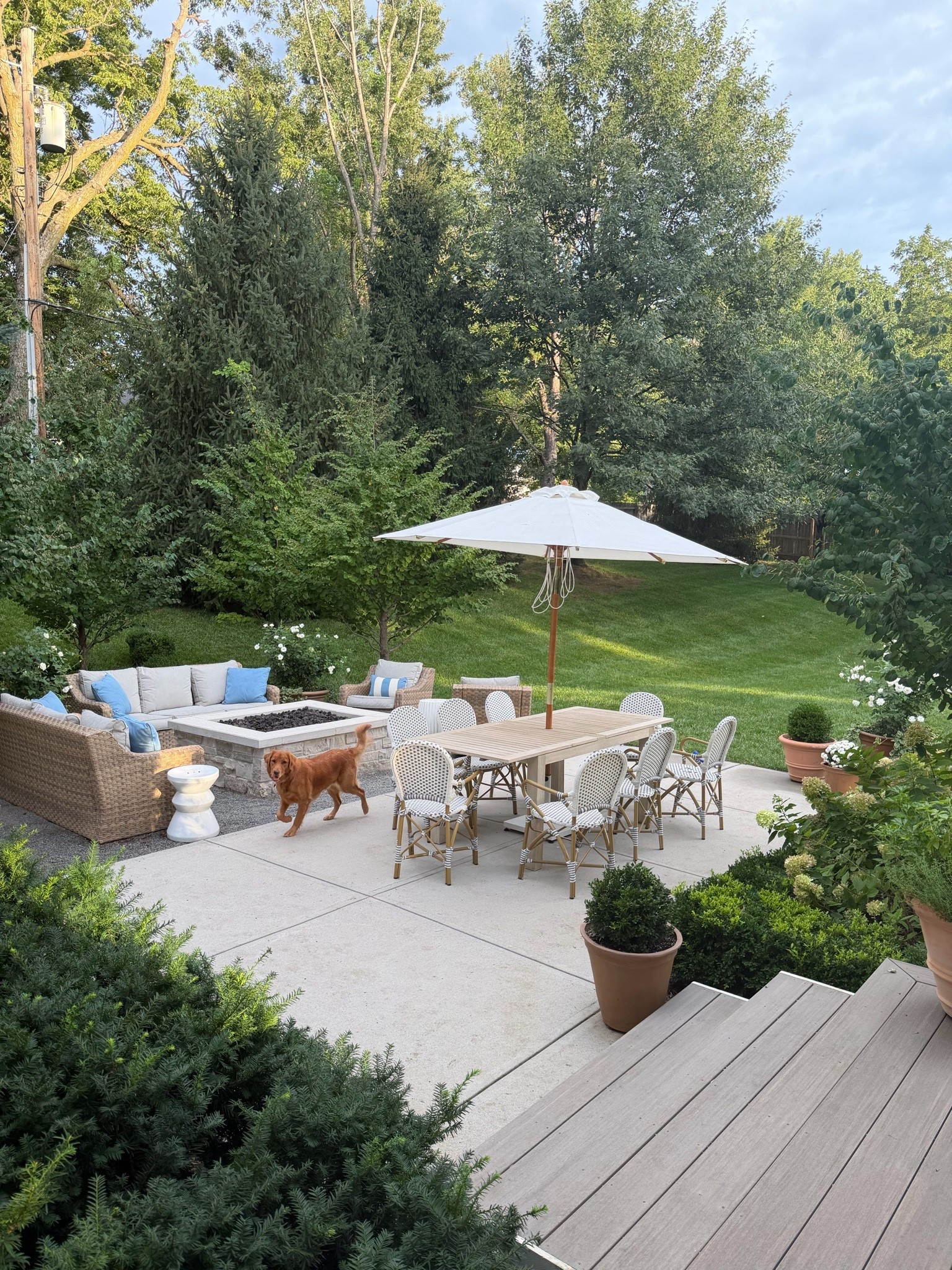 Enjoying these last few weeks of summer on our outdoor patio. 💙 Our outdoor dining table has been the perfect spot for family dinners, and I love how the outdoor umbrella, rattan woven sofas, blue pillows, and outdoor chairs make the space feel like an extension of our home.

Trying to soak up every bit of patio season before fall arrives!

#LTKHome #LTKSaleAlert