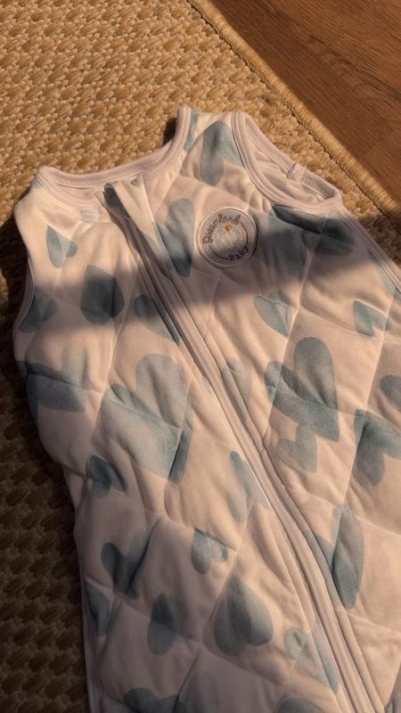 This is the new print from dreamland baby.  I bought my son the sleep sack & pajamas with the blue heart on it. I got him the size large & size 18-24 months.

He is about 25 pounds and 32 inches. Leo is 11 months old I am not able to link dreamland directly, but you can use my code Kissthisstyles  on their website for 15% off offsite wide.

Dreamland baby 
dreamland, baby discount code valentine’s Day pajamas for baby 
valentine’s Day sleep sack for baby 
heart pajamas for baby 
Heart sleep sack for baby
Weighed sleep sack
Bamboo pajamas 
Baby pajamas
Baby sleep sack
Sleep routine for baby
Baby sleep must haves 
Must haves for baby sleep routine 

#LTKbaby #LTKbump #LTKkids