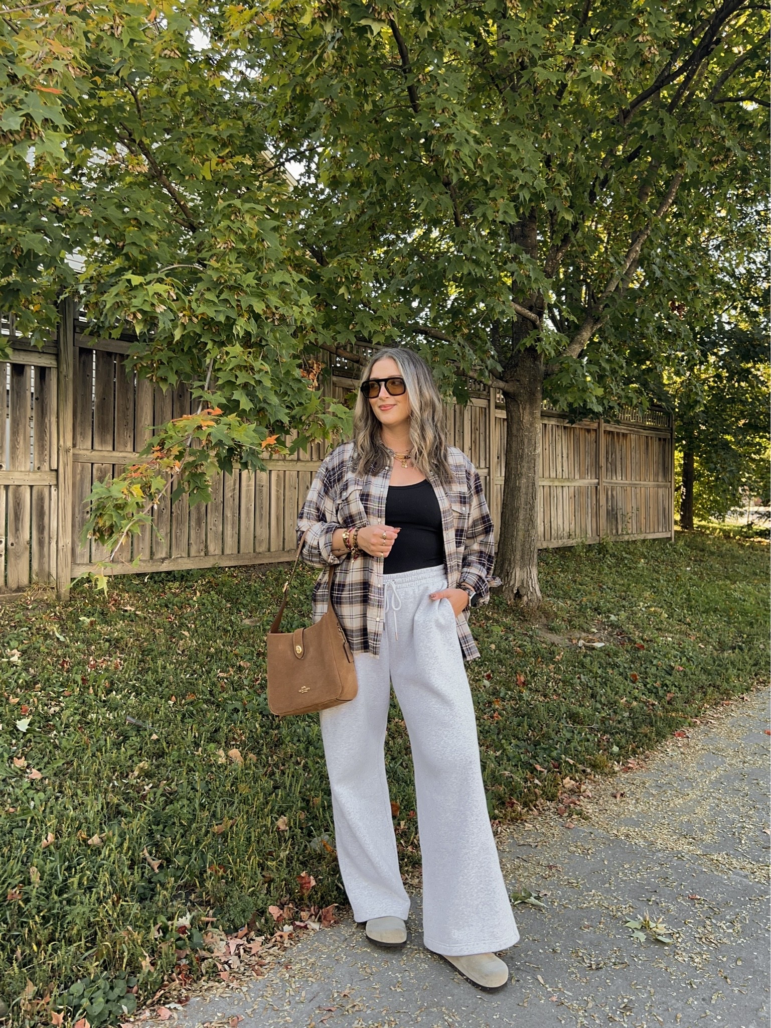 Comfy fall outfit! Wearing M in the bra free tank, L in the wide leg sweatpants (could have done M). Sized up to XL in the plaid flannel shirt for an oversized fit. I’m a 9.5-10 and wear a 40 in the Birkenstock clogs

#LTKfall #LTKsale #LTKstyletip
