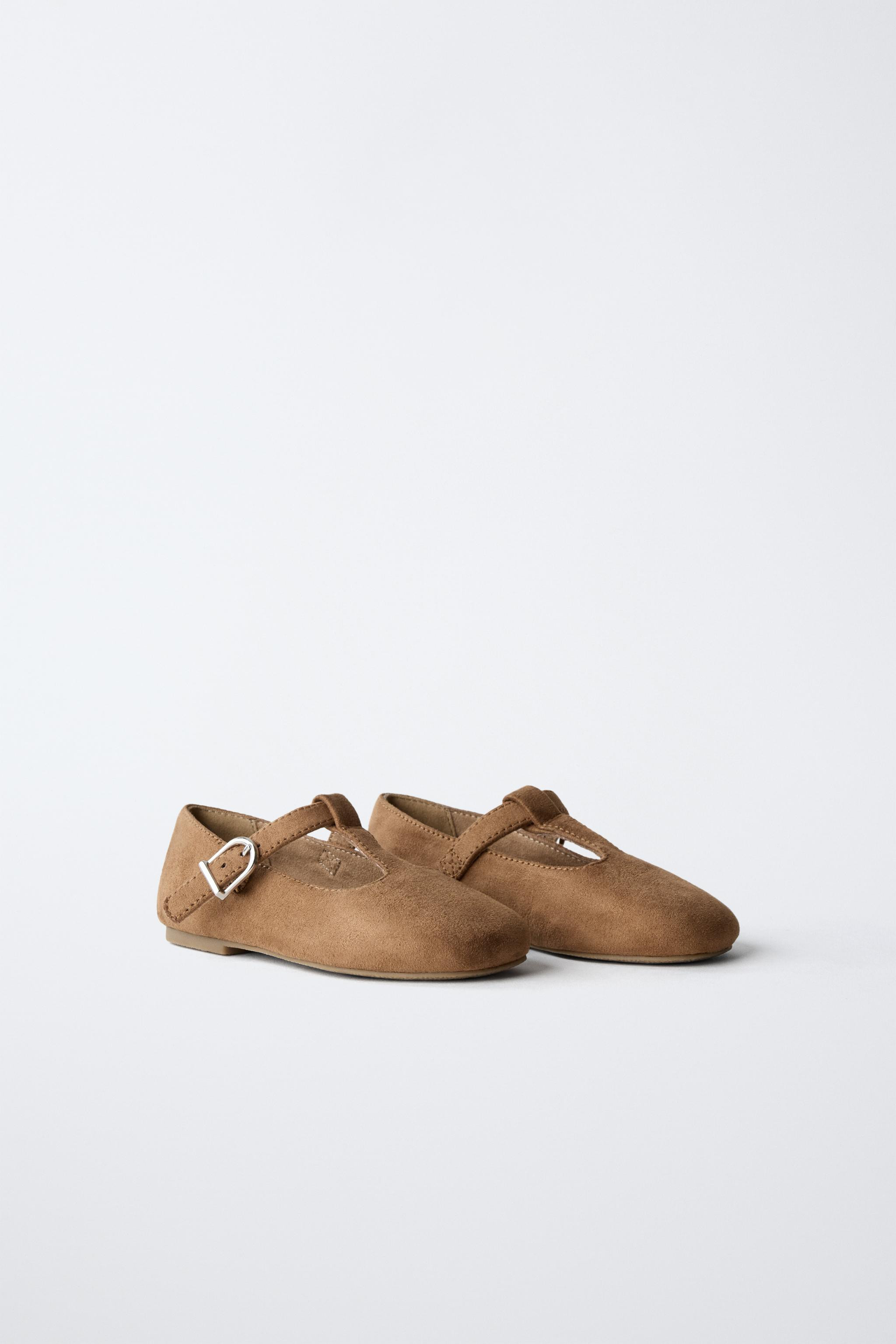 NEWT-BAR BALLET FLATS$ 35.90Brown | 6539/630/105Add to cartAddT-bar ballet flats. Side buckle clo... | Zara US