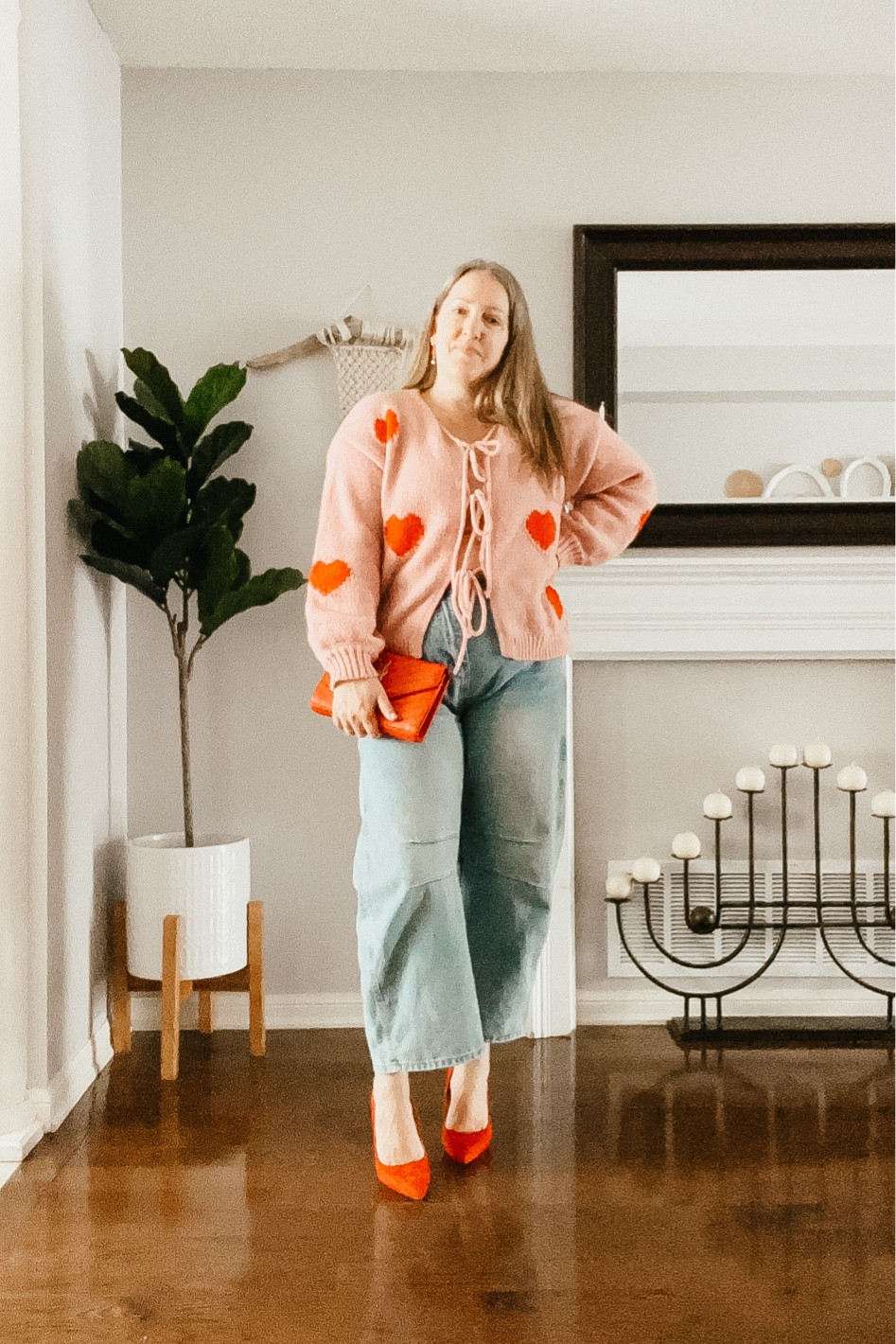 Valentine’s Day outfit
Pink heart cardigan, barrel denim, red heels, red purse 

#LTKStyleTip #LTKOver40 #LTKSeasonal