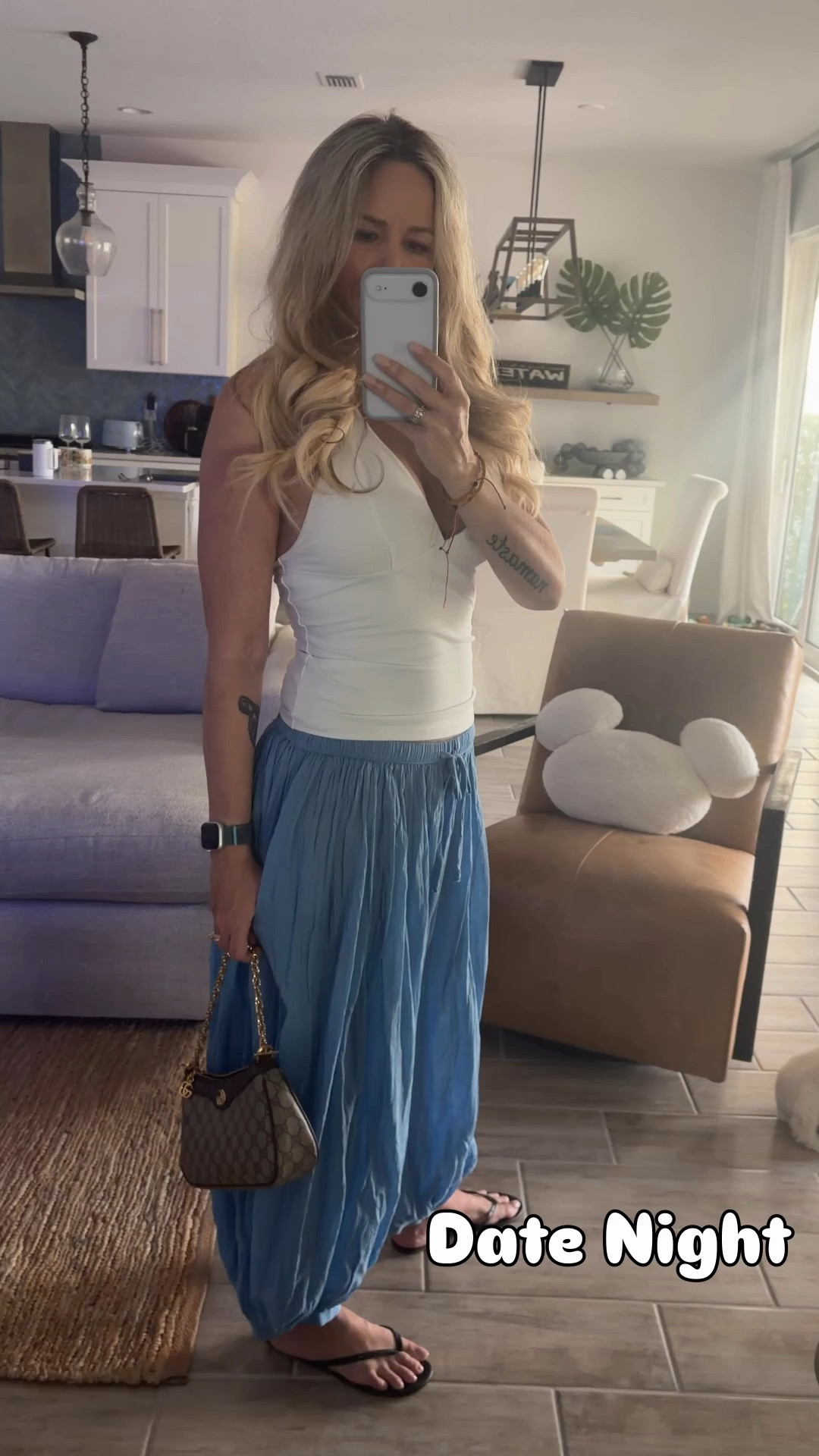 Date night but make it effortless 💙

Wearing the Free People “Had Me At Hello” halter (XS/S) with the Playa Party balloon pants in Blaze Blue (XS) and I’m obsessed with this combo.

It’s one of those outfits that feels a little elevated but still super easy — perfect for dinner, drinks, or a beachy night out.

Styled it with:
• TKEES Sable sandals
• Gucci Ophidia bag
• Anthro delicate glam collar necklace

This is exactly the kind of look I love for warm nights — comfortable, flattering, and still feels put together.

Everything linked in my LTK.

#LTKStyle
#FreePeople
#DateNightOutfit
#VacationOutfits
#Over50Style
#LTKFinds


#LTKOver40 #LTKootd #LTKdayinmylife