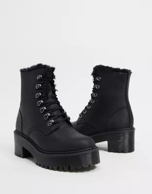 Dr Martens Leona fluff lined heeled ankle boots in black | ASOS (Global)