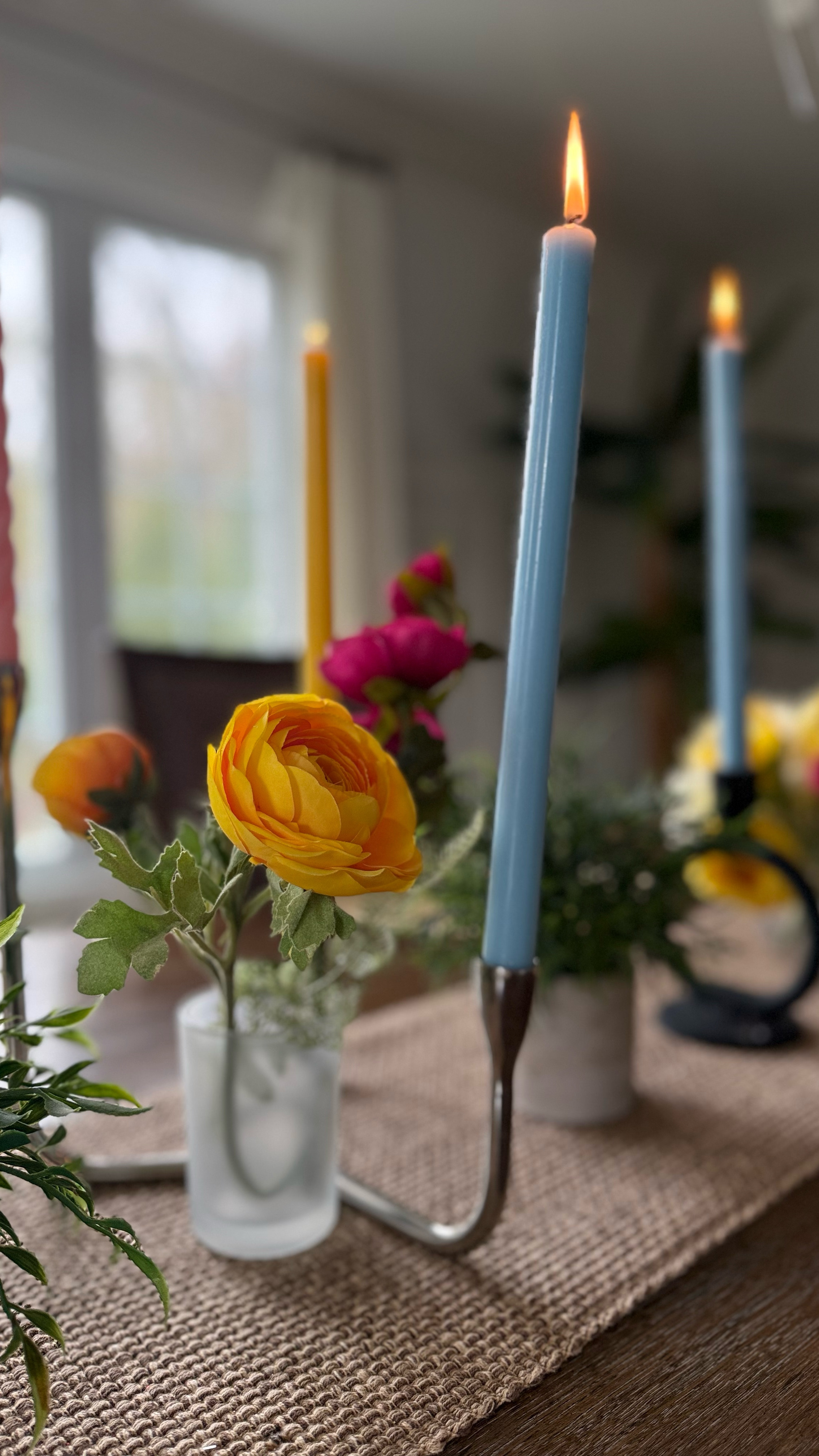 Table setting for Easter/spring season! 
Candles, flowers, vase, flame, candleholder and the power of a good themed napkin 🌸💐🕯️

#LTKPlusSize #LTKU #LTKBeauty