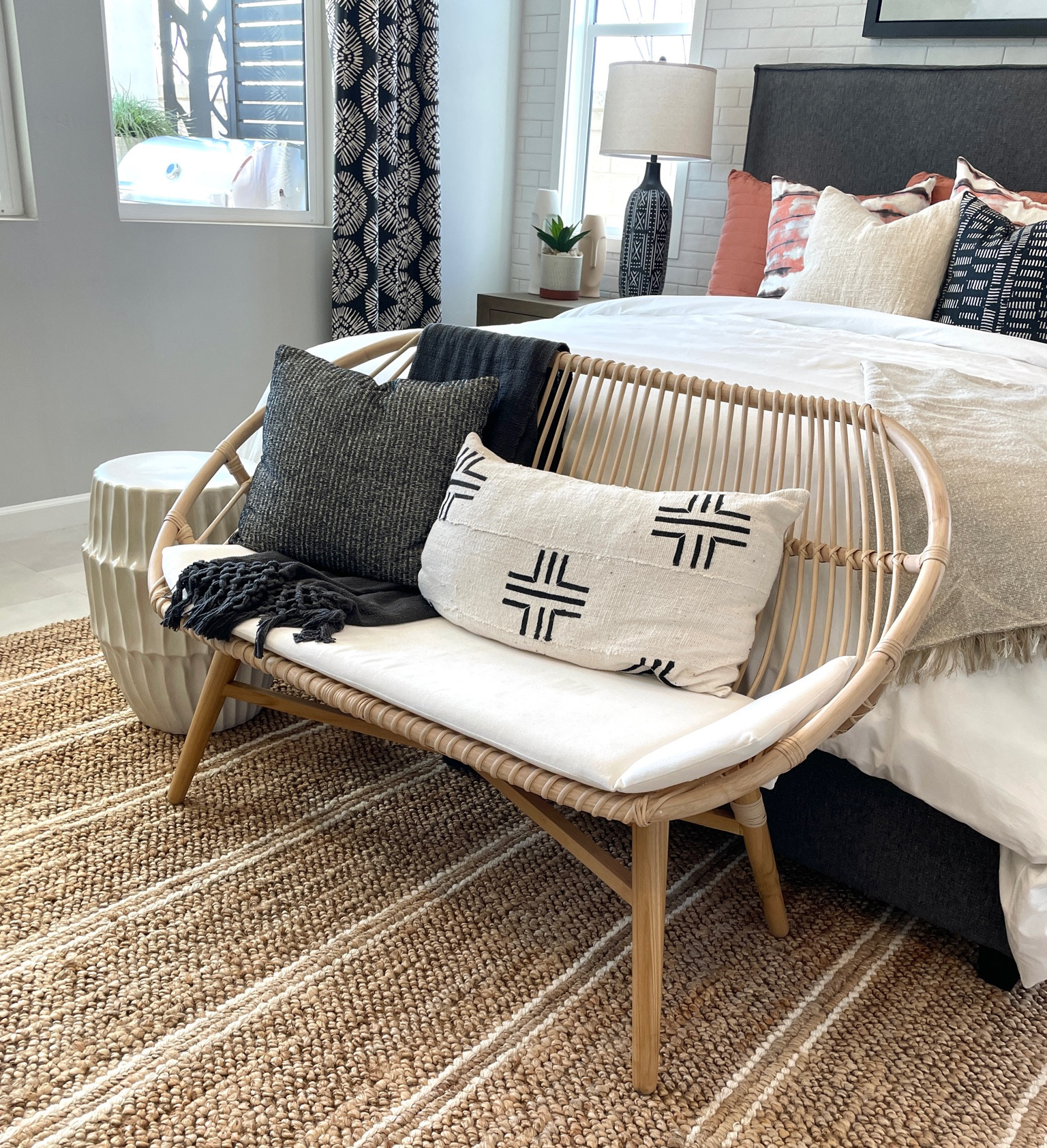 #home #bedroom #ratanbench #ratansofa #natural #mudclothpillow #boho #rustichome #drumendtable #barnhouse #farmhouse #homedecor #neutralhome 

#LTKhome #LTKfamily #LTKFind