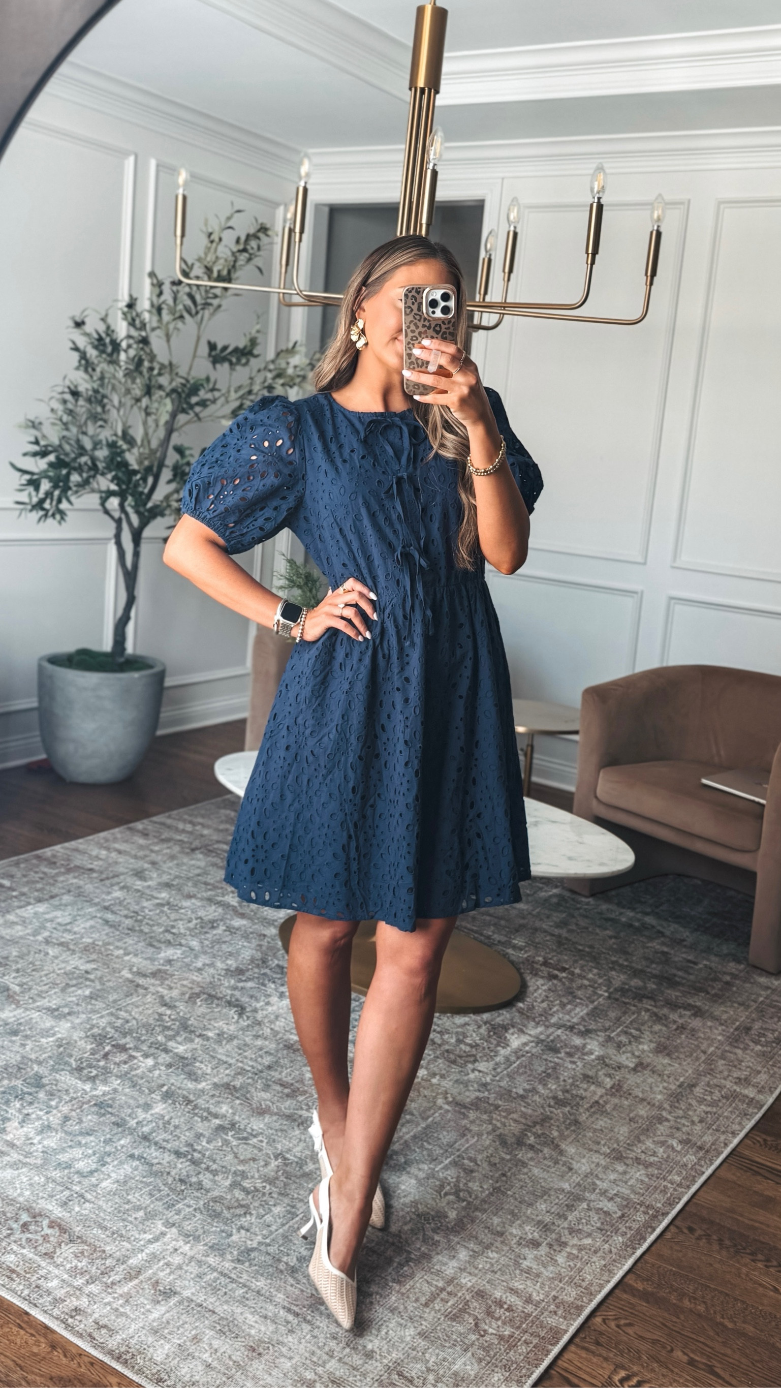 This spring dress is so flattering. The eyelet pattern and bows down the front make it sweet and fun for date night outfit or as a wedding guest dress!

#LTKStyleTip #LTKWedding #LTKParties