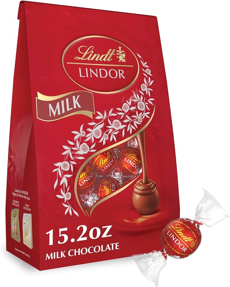 Lindt LINDOR Milk Chocolate Candy Truffles, Valentine's Day Chocolate, 15.2 oz. Bag | Amazon (US)