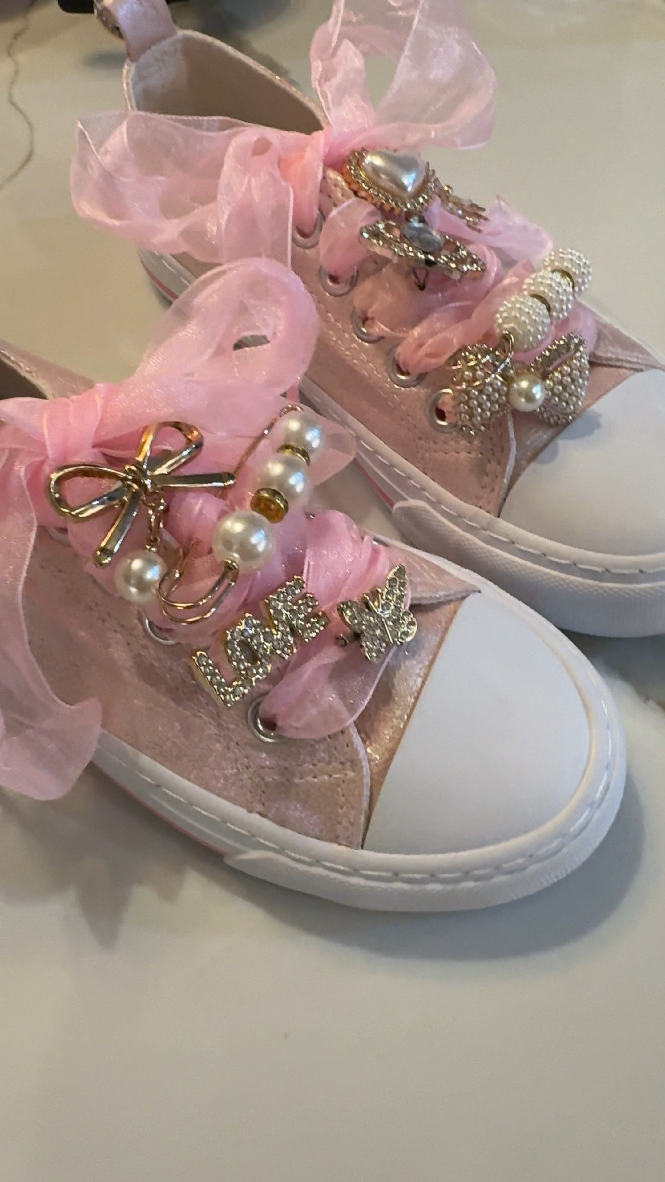 Emmy’s Taylor Swift Era’s Tour charmed / bedazzled sneakers. The perfect shoes! 😍