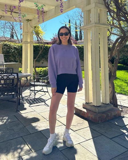 Spring athleisure inspo with a pop of color 

Lilac sweater - xs, old, linked to similar style 
Shorts 
Varley sneakers - tts 
Socks 
Sunglasses 

Casual outfit inspo / spring style / summer style / lilac / shorts / sweatshirt / sporty 

#LTKstyletip #LTKSeasonal