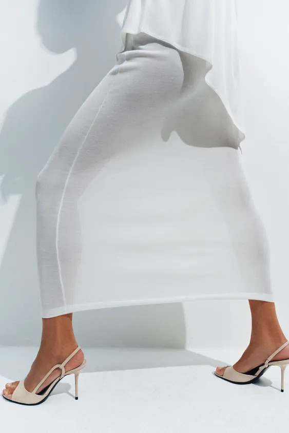 Sandal-style shoe with a high stiletto heel. Patent finish. Front strap. Back strap with elastica... | Zara US