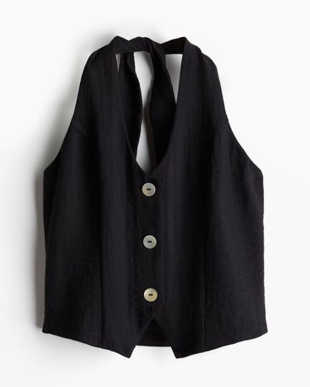 Black halter neck vest 

#LTKSeasonal #LTKfindsunder50 #LTKstyletip