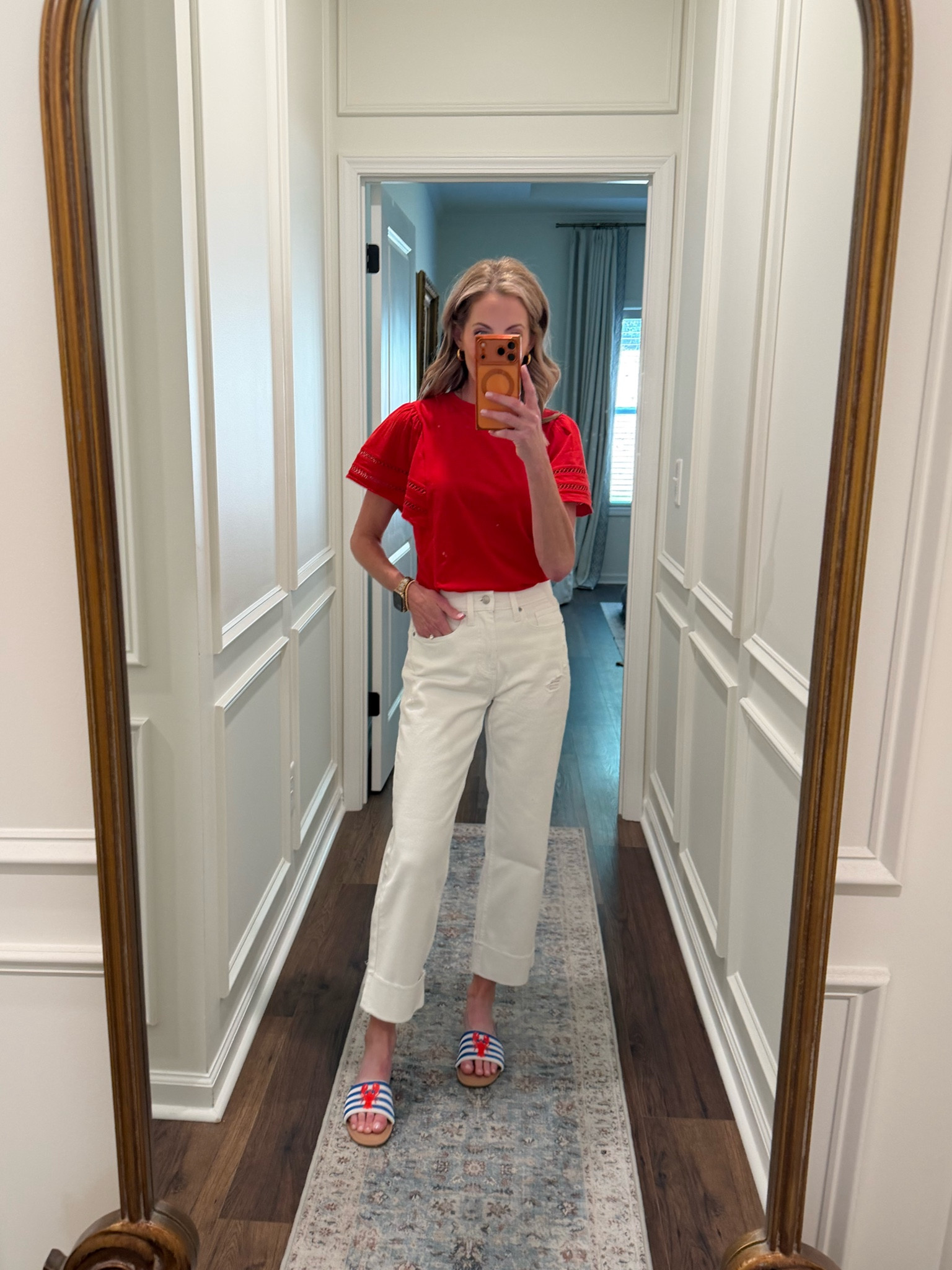 My favorite red shirt has been restocked. I love this flutter sleeve top. It is so good. I bought it in three other colors less than $15. Paired with these jeans less than 30. 