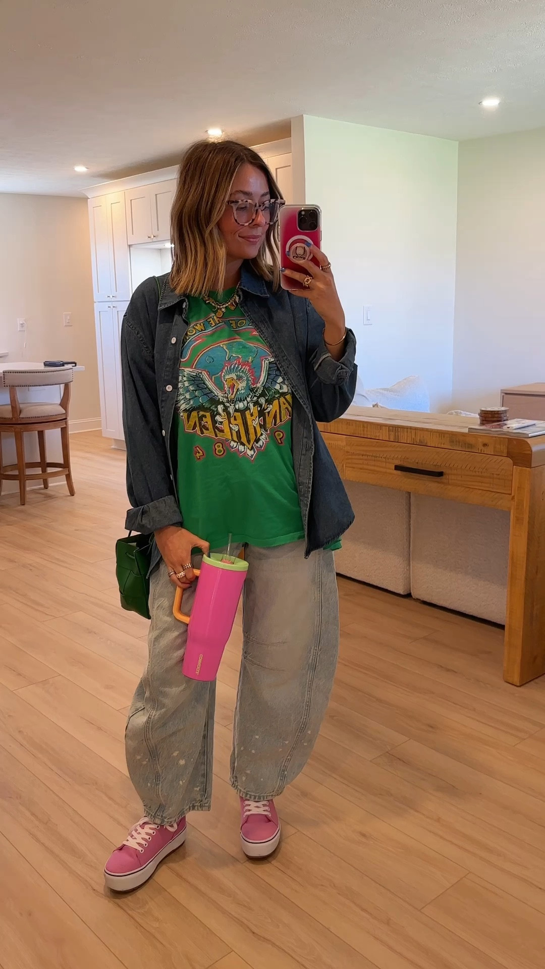 Wearing medium in the jean shirt, large in the tee, 24 in the jeans!