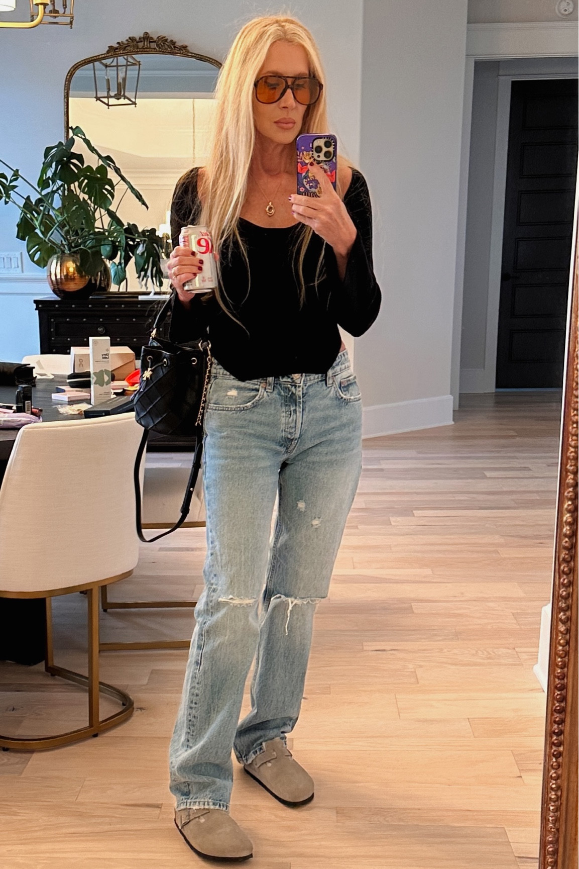 Ootd Amazon khaite top dupe 
Boston clogs Birkenstocks 
Tory Burch Fleming bucket bag 
Missoma jewelry 

#LTKshoecrush #LTKitbag #LTKunder100