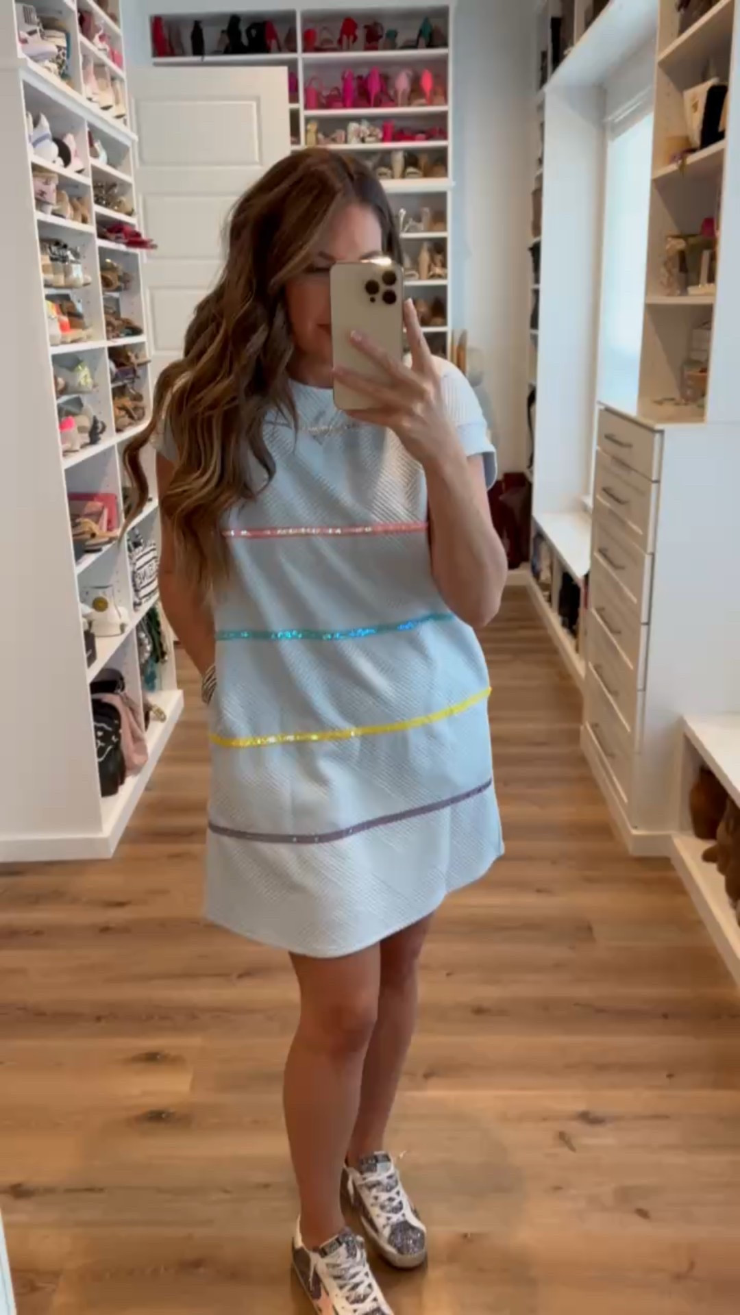 In a medium colorful sequin stripe t shirt dress, sneakers and accessories - fits tts.

#LTKSeasonal #LTKFindsUnder50 #LTKStyleTip