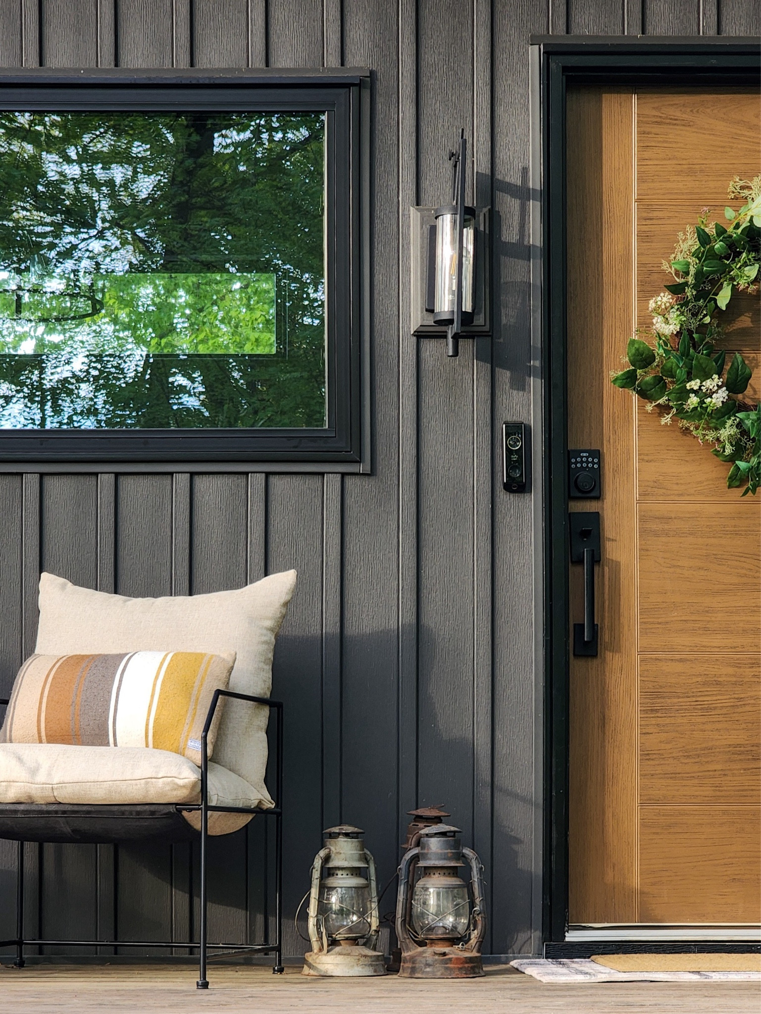 For this year's spring - summer front porch look, I used most of the same decor from last season with a sprinkle of new additions. 

Old || Striped lumbar pillows • botanical wreath • natural modern geometric door mat • Chris Loves Julia x Loloi Humphrey layering rug

New || Contemporary metal chairs with tan cushions • Vintage lanterns • (Not pictured, but ordered) Metal planter stand to display vintage lanterns

#LTKHome #LTKSeasonal