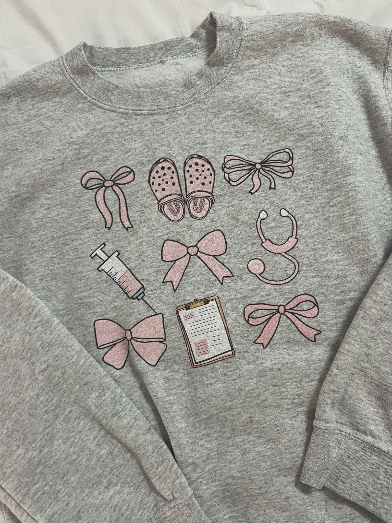 The cutest nursing sweatshirt🎀👩🏼‍⚕️

#LTKGiftGuide #LTKHoliday #LTKWorkwear