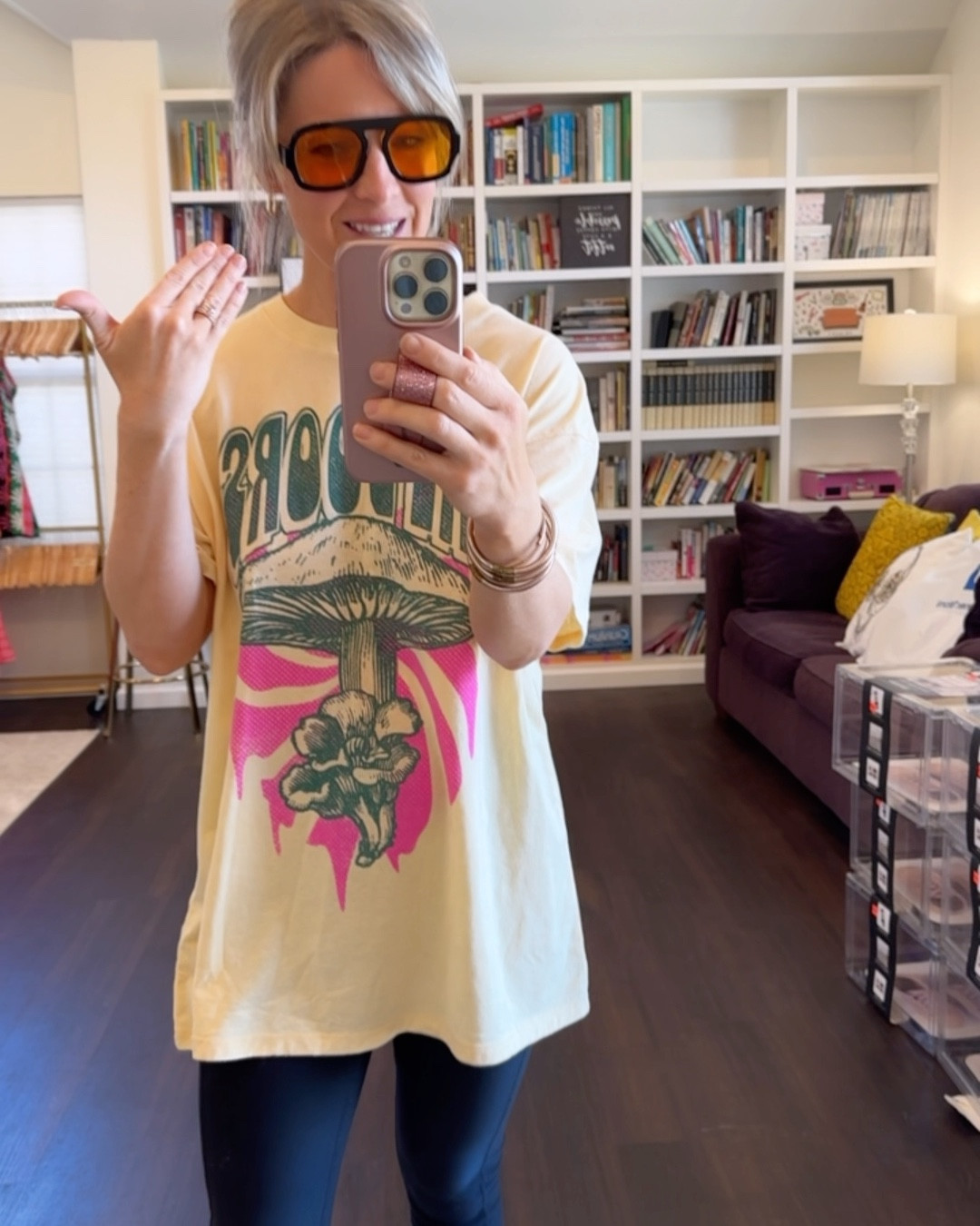 Decided I’d try the new 70s sunglasses trend…I still don’t know what I think about the colored lenses, but these aviators are so popular! Also, who doesn’t love a good concert graphic tee?! This one looks like a $40 version, but it’s only $12! And butter yellow is so IN! 🧈💛💛💛 it’s oversized. I’m wearing my true size XS (5’2” 109 lbs.) 

#LTKSaleAlert #LTKStyleTip #LTKPetite