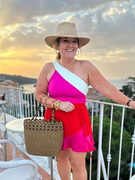 Golden hour last night. And wearing it again today for our boat cruise up and down the amalfi coast. 

Size 14/XL in the suit and wrap. Use code NANETTEJS10 for 10% off, unless there’s already a promotion. 

Hat abs bag are patented squishable. I did wear the hat since I only brought carry one. But the tote fit right inside my backpack, and I packed inside it. 
10% off Eric Javits code SWEETFRINGEBENEFITS10OFF 

#LTKover40 #LTKtravel #LTKHoliday