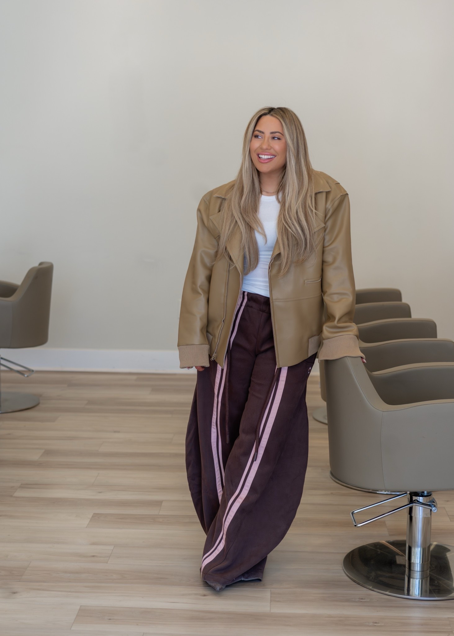 Tan jacket brown pants 

#LTKgrwm