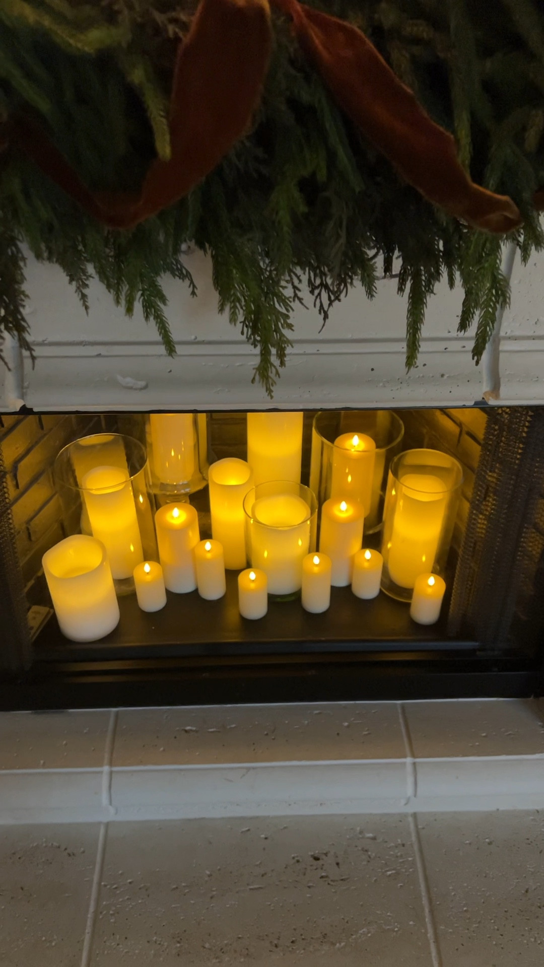 LED candles in the fireplace make for the most magical glow all year long 🕯️ 



#LTKHome #LTKHoliday