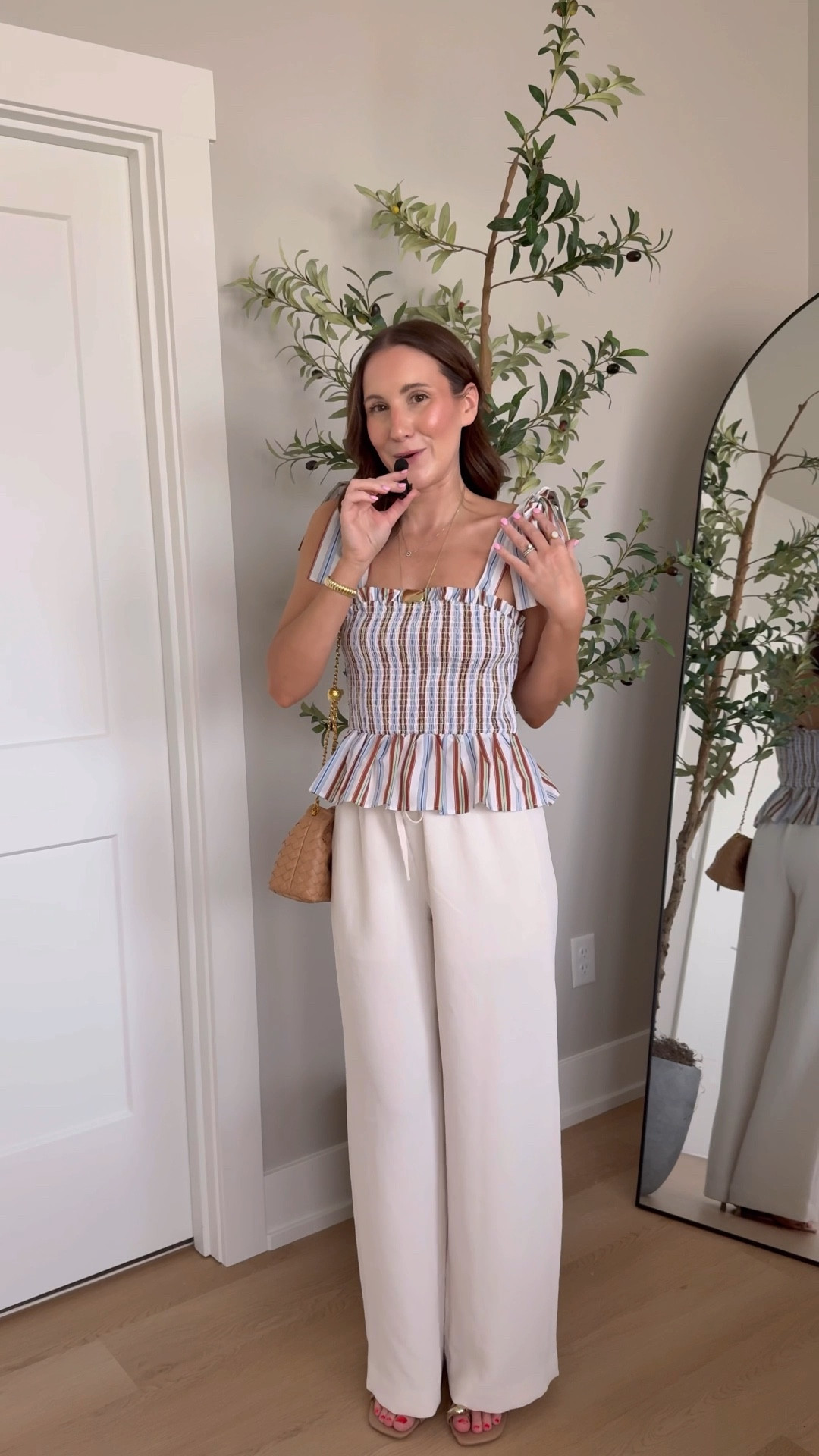 This @Zara top is so cute! I love the unexpected color combo and the peplum fit! Paired with my absolute favorite aritzia pants, but it would be just as cute with denim shorts!

Zara style, lodge pants, vacation style, peplum top, outfit idea, outfit inspo, Zara finds, Amazon bag, Amazon shoes 