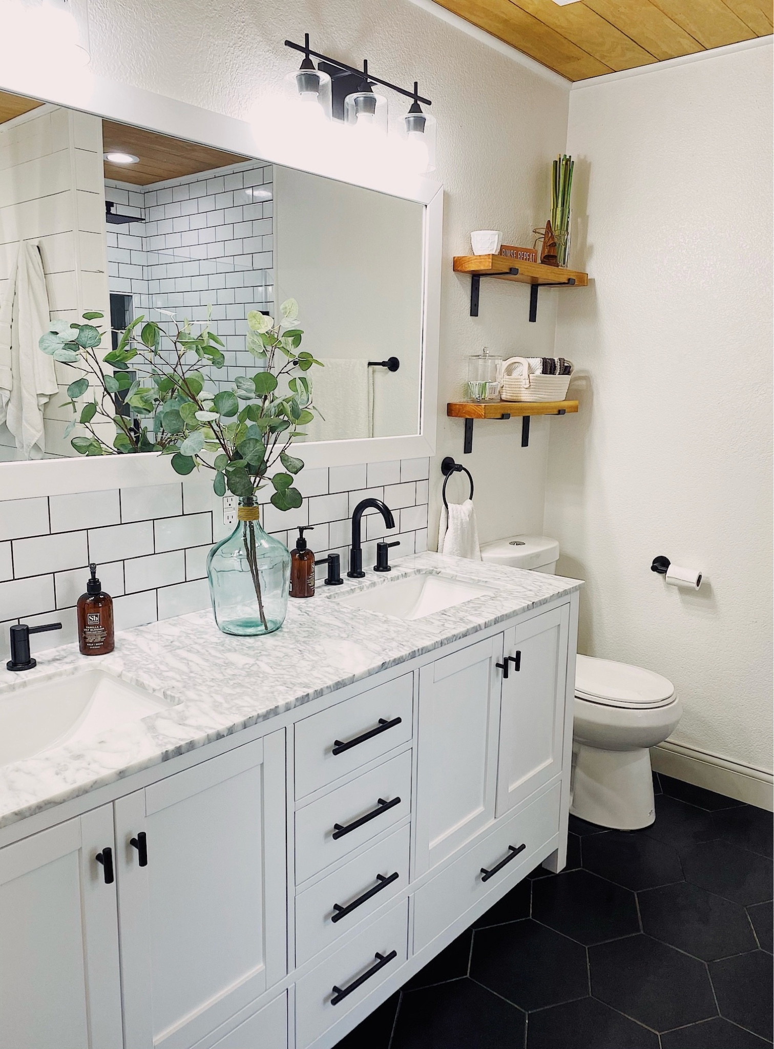 Bathroom styling! White bathroom decor. 

Neutral bathroom decor, farmhouse bathroom, affordable bathroom decor, eucalyptus leaves, floating shelves, white decor, white vanity, affordable vanityy

#LTKhome #LTKfindsunder100 #LTKsalealert