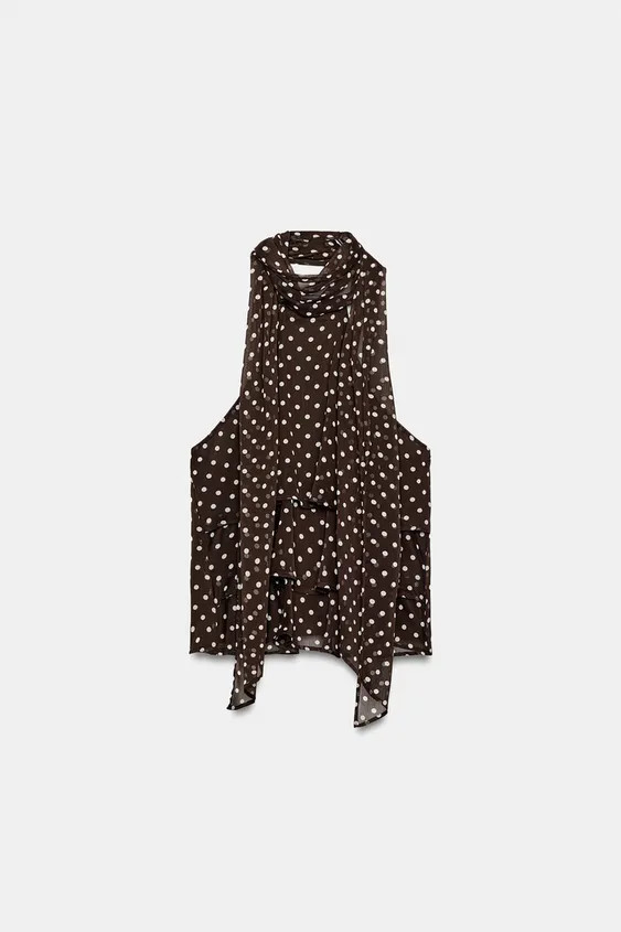 Halter neck top with ruffles and open back. Featuring hidden button fastening at the back. | Zara UK