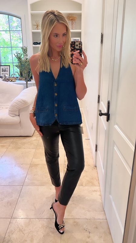 Obsessed with this denim vest and leather pants outfit. Size down one in the vest halter top! 

Country concert
Concert outfit
Rodeo outfit
Western outfit
Denim vest
Leather pants 

#LTKstyletip