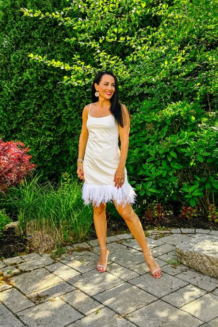 White faux leather dress with feathers 

Rehearsal dinner dress
Bride
Party dress 
Graduation Dress 

#LTKStyleTip #LTKWedding #LTKParties