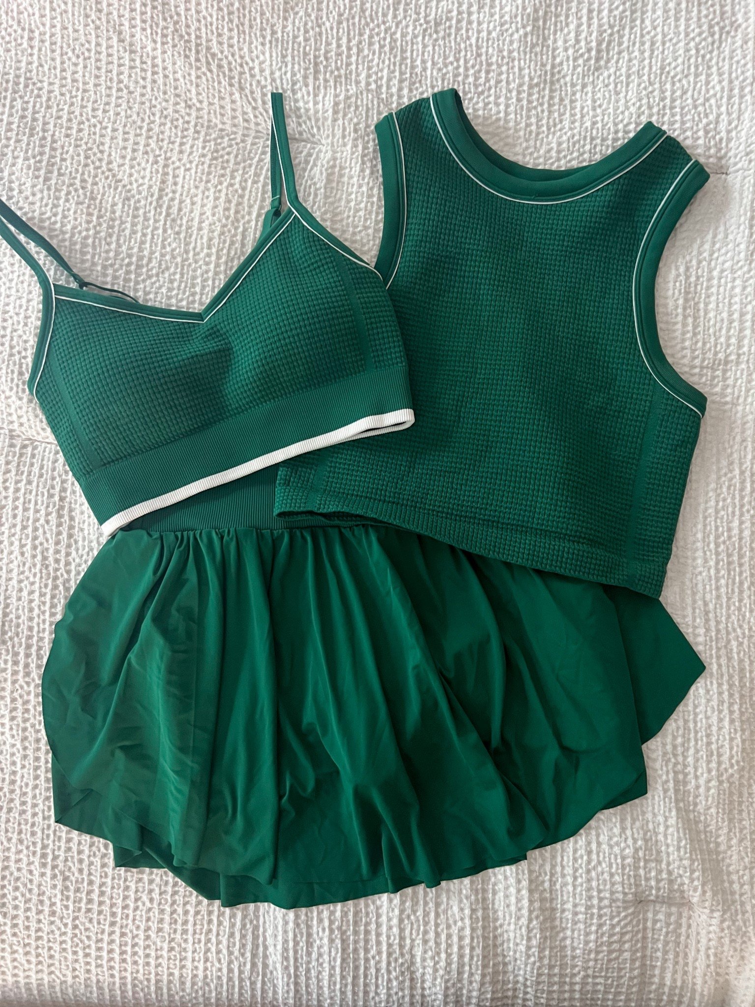 This athletic matching set is an add to cart! The skirt has built in shorts + I love that you have two different style tops to choose from

#LTKPetite #LTKActive #LTKFindsUnder50