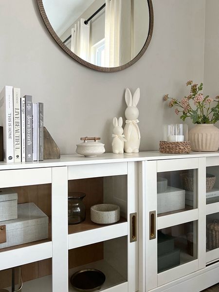 I spy the cutest neutral bunnies for Easter! They come in 3 sizes. Seen here see the 16” and the 9”. 

Easter decor / console table / media
Cabinets / sideboard / neutral / furniture/ promontory cabinet / Walmart finds / bunny decor / stems / vases / modern coastal / books / round mirror / hearth and hand / magnolia / studio McGee / spring decor / faux flowers 

#LTKSpringSale #LTKhome #LTKSeasonal