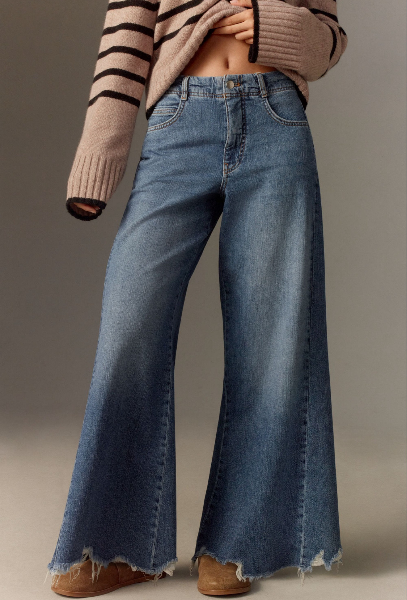 My new favorite jeans! 👖 ✨ Love the wide leg and raw edge hem detail - they also got the approval of my 9 year old fashionista so a win-win! 

#LTKMidsize #LTKOver40 #LTKStyleTip
