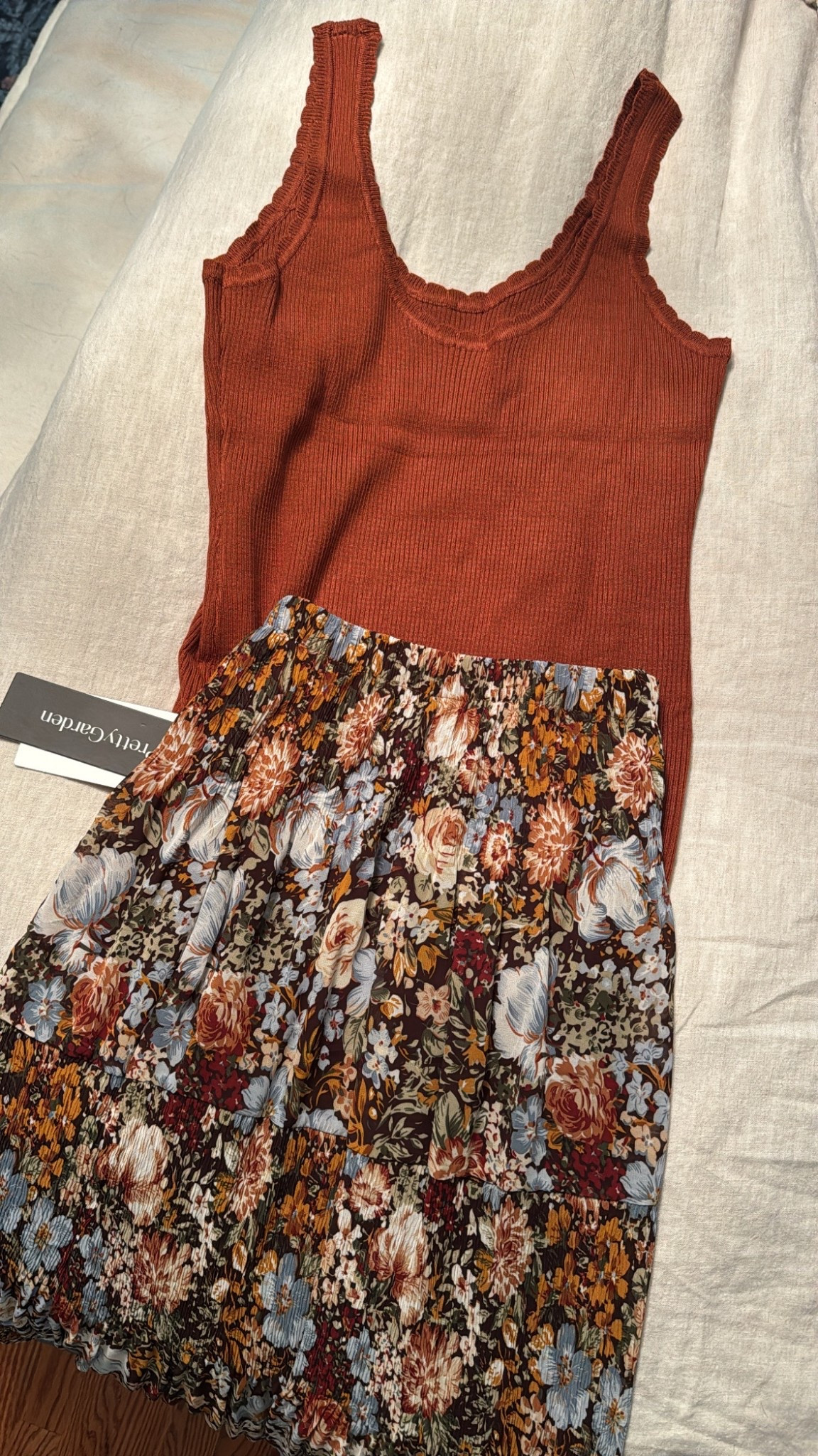 This outfit arrived today and it’s so cute. This ribbed tank with dainty scallop detail around the neck is so cute. There are several colors available and I’ll be ordering more. I also love this chiffon maxi skirt. Perfect for so many seasons. Could add a denim jean jacket in the fall. 

#LTKSeasonal #LTKOver40 #LTKSaleAlert