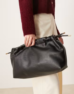 ASOS DESIGN ruched top clutch bag with plait ties in black | ASOS (Global)