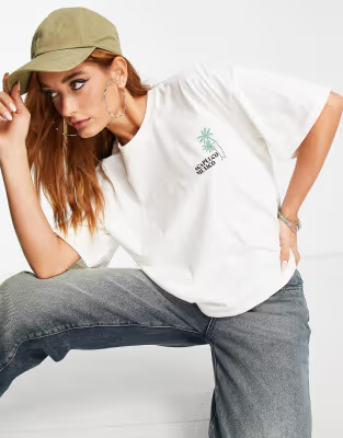 ASOS DESIGN T-shirt with Mexico and palm tree pocket graphic print in off white | ASOS (Global)