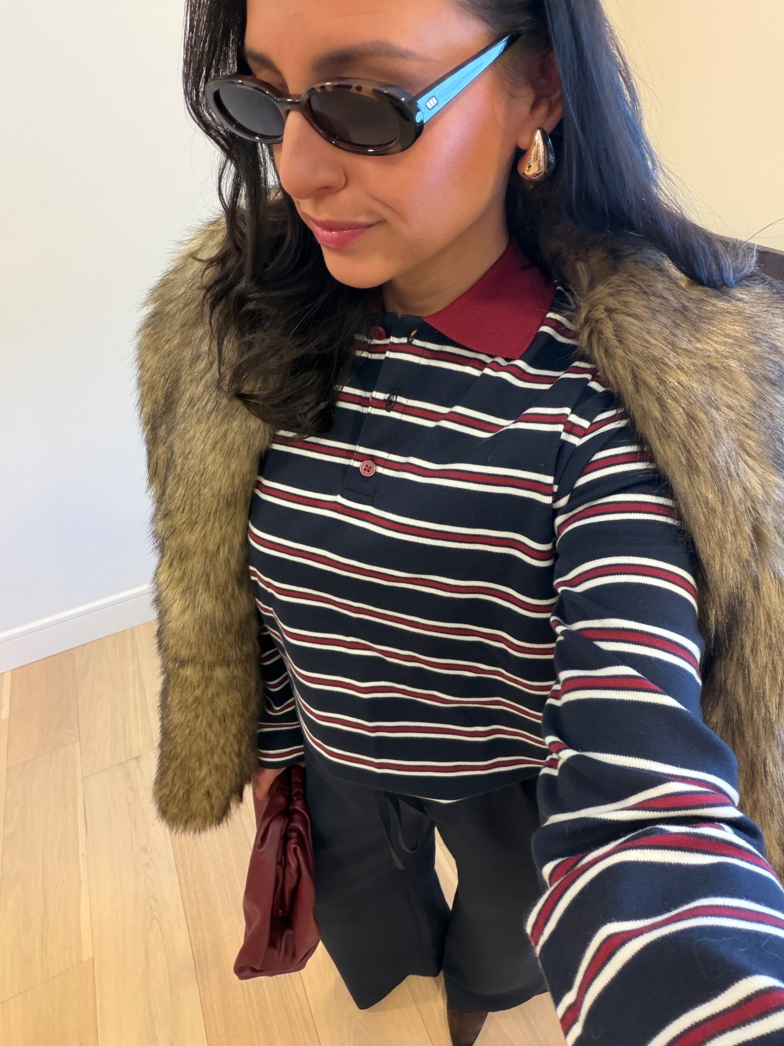 What I worked to a store event
Winter outfit look 
Casual winter outfit 
Aritzia top (xxs) and lodge pants in Small.  
Bottega bag 
Brown suede booties
Faux fur coats 
Le specs sunglasses
Anthropology earrings. 