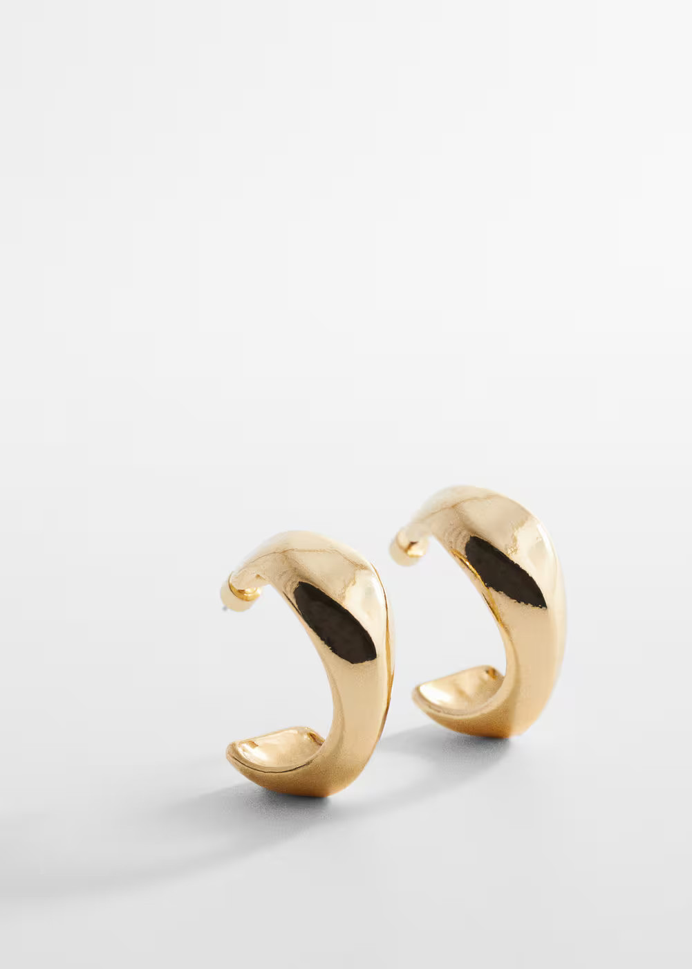 Twisted hoop earrings -  Women | Mango USA | MANGO (US)