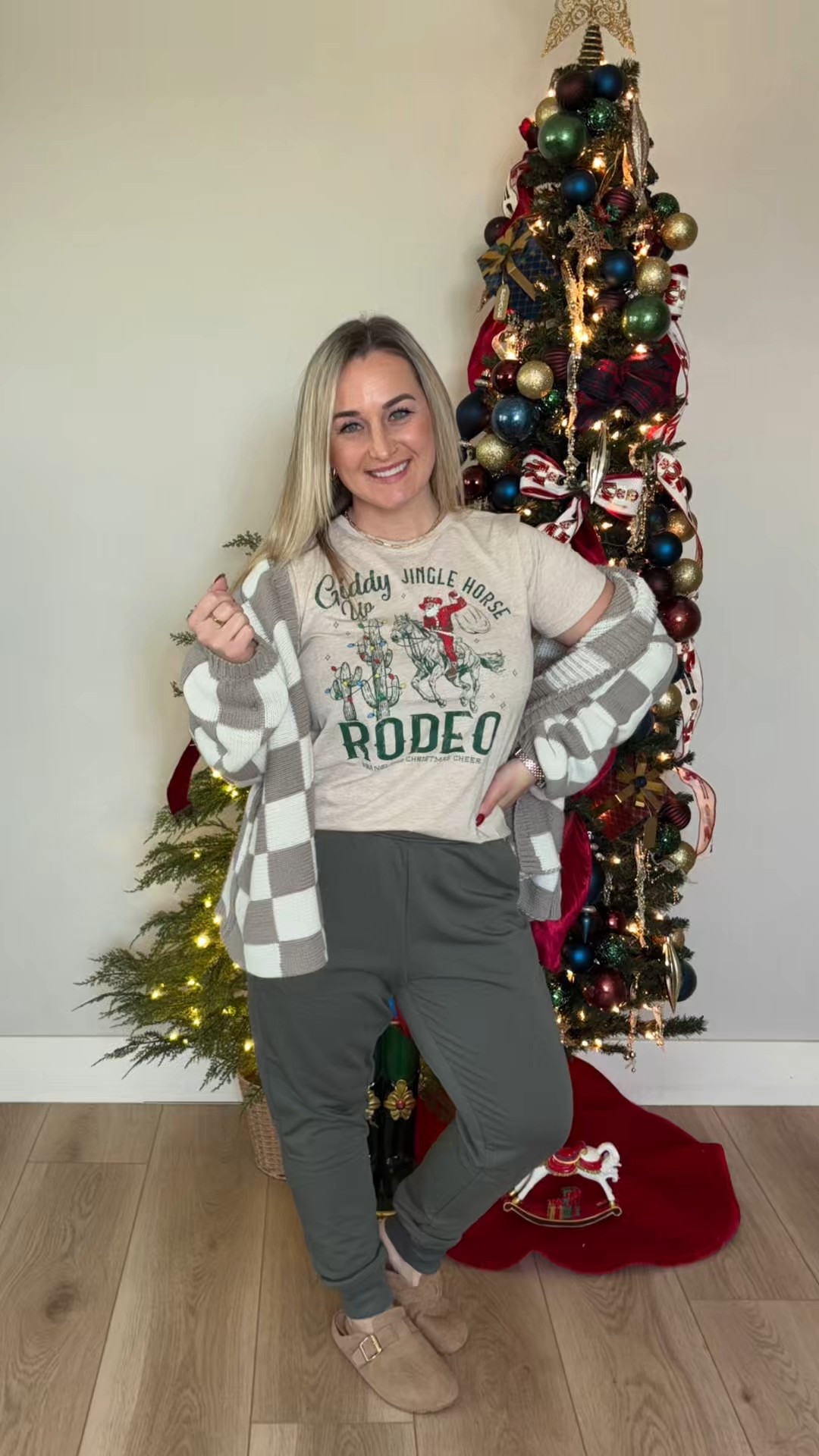 Day 21 of 25 Days of Christensen Christmas 🤍🎄

Today’s outfit is all about laid-back holiday comfort with a little western Christmas flair. This festive graphic tee paired with an oversized, soft cardigan is giving cozy-but-cute energy—perfect for slow mornings, wrapping gifts, or lounging by the tree. Finished it off with comfy joggers and fuzzy slippers because if it’s December, comfort is non-negotiable.

This look proves you don’t need sequins to feel festive—sometimes all you need is a cozy layer, a fun holiday tee, and a relaxed vibe to soak in the magic of the season. ✨🎁

#25DaysofChristensenChristmas #Day21 #CozyChristmas #HolidayLoungewear #FestiveStyle #ChristmasOutfits #ChristensenChristmas

#LTKHoliday #LTKgrwm #LTKootd
