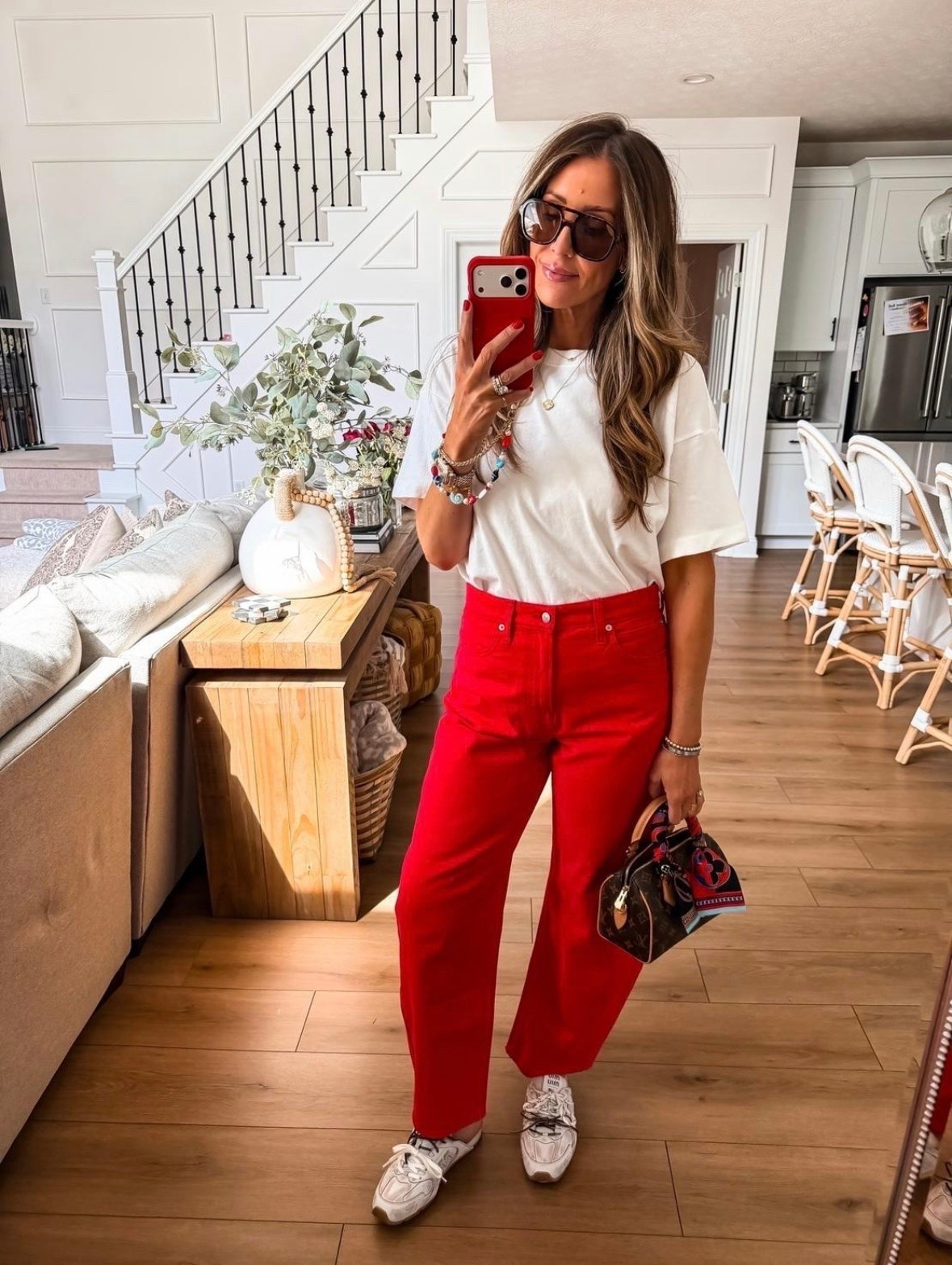 This pop of red is such a fun way to bring color into an everyday outfit. The relaxed white tee keeps it casual while the red jeans add a statement moment without feeling overdone. Paired with sneakers, it’s a comfortable look that still feels put together for errands, lunch, or a busy day out.

red jeans white tee casual outfit colorful denim everyday style sneakers outfit fall transition outfit women’s fashion classic basics casual chic outfit TheMomInStyle

#LTKootd #LTKgrwm #LTKSeasonal