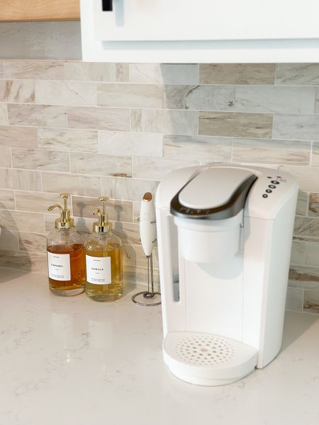 Cafecito station ☕️ my white Keurig coffee maker is on SALE!! 

Coffee station, coffee bar, white coffee machine maker, coffee syrup dispensers bottles, syrup bottles white pump, hand mixer, coffee nook, kitchen ideas, kitchen decor 

#LTKFind #LTKhome #LTKunder50